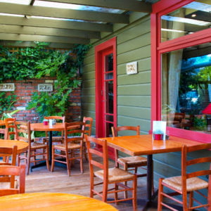 a restaurant with tables and chairs