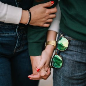 a group of people holding hands