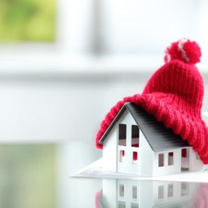 a red hat on a window