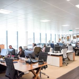 a group of people in an office