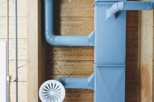 a blue door with a white fan