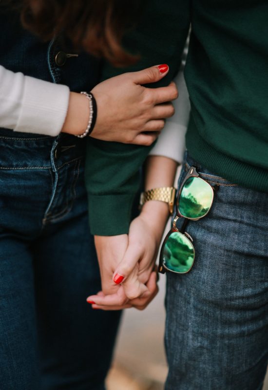 a group of people holding hands