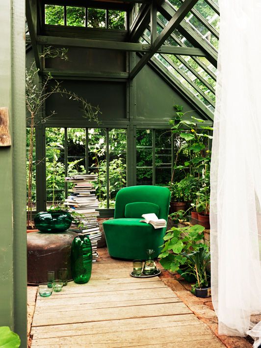 a green chair in a room